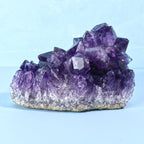 Side view of Uruguayan amethyst geode with sharp crystal points