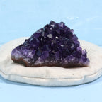 Uruguay Amethyst naturally sitting on a rock pillow