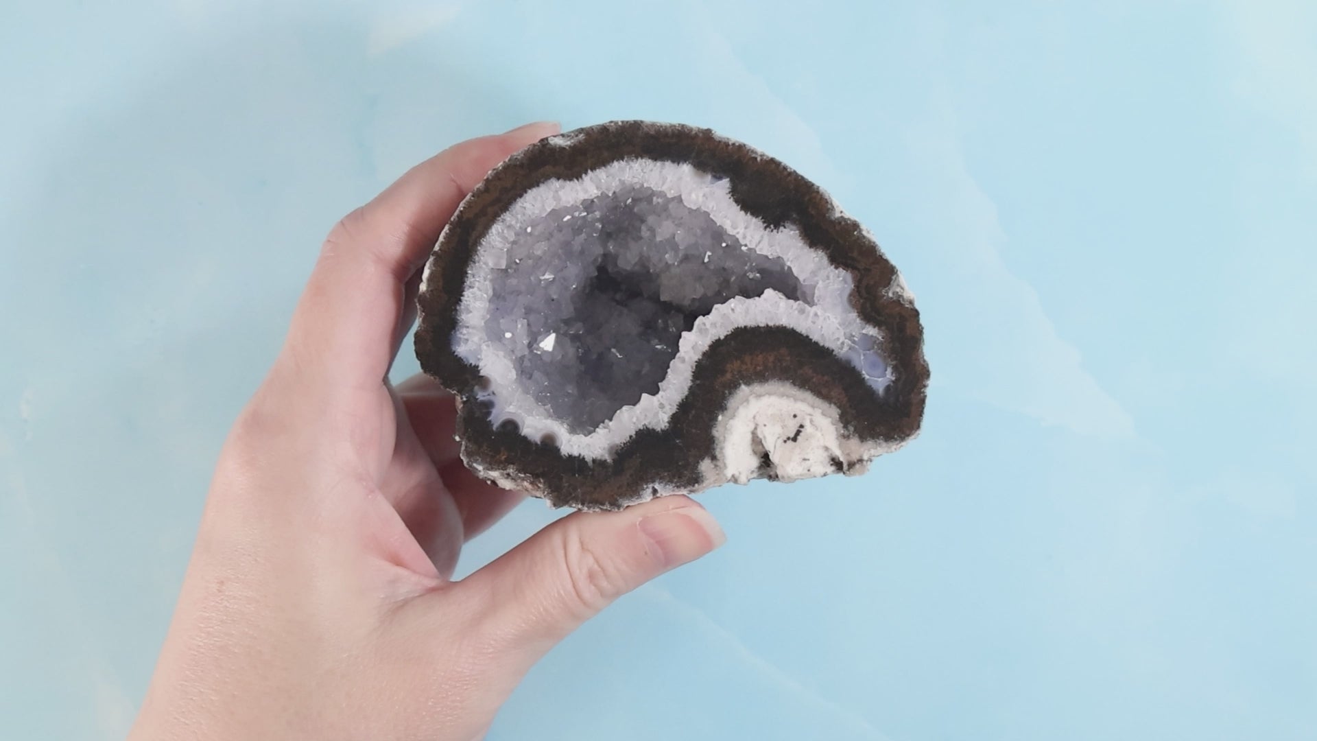 Las Choyas Coconut Geode 33b - Quartz Crystals with Blue Backing.